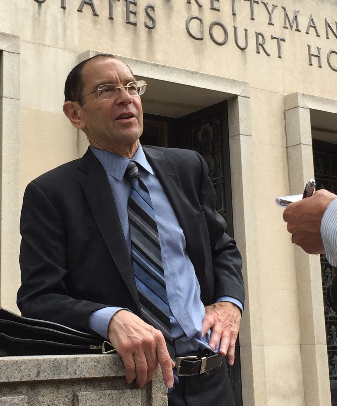 Attorney Bruce Fein being interviewed in front of U.S. District Courthouse on 9/29/15 (photo)