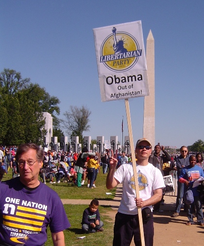 Libertarian Wes Benedict Obama Out of Afghanistan sign at One Nation March