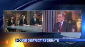 Screen image of ABC-7 host Alan Cohn at right moderating televised debate; text on screen 'House district 72 debate'; three candidates seated together on left half of split screen at desk are, from left: Margaret Good, Alison Foxall, James Buchanan, all wearing dark blazers (color screen image)